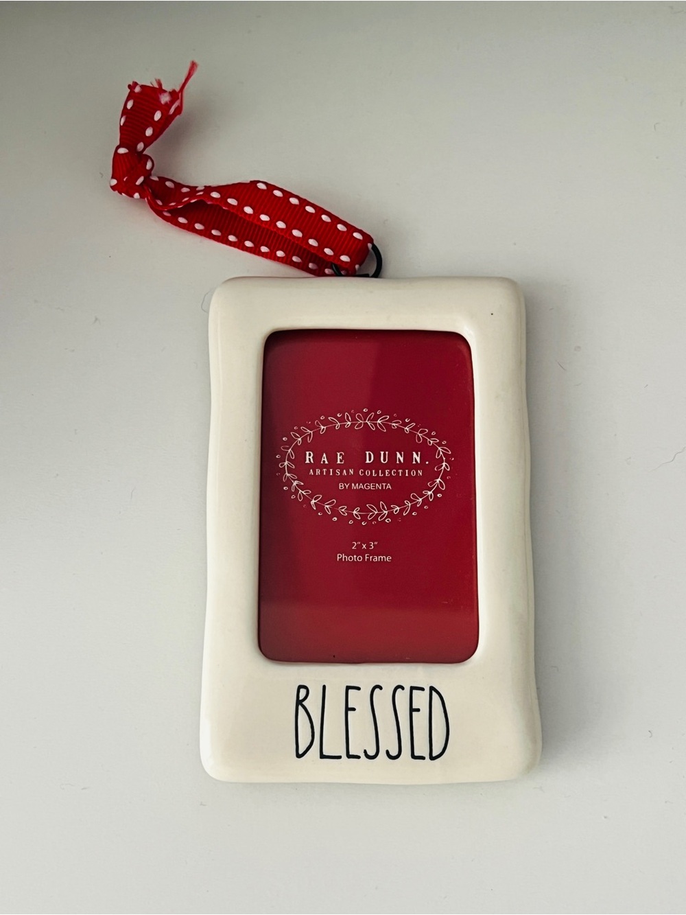 Rae Dunn Blessed White Ceramic Frame with Red and white stitch hanging Ribbon
